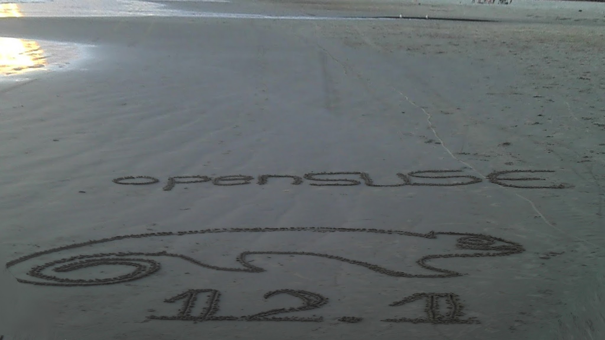 Carlos painted openSUSE on the Beach in Brazil